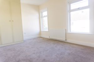 Bedroom One- click for photo gallery